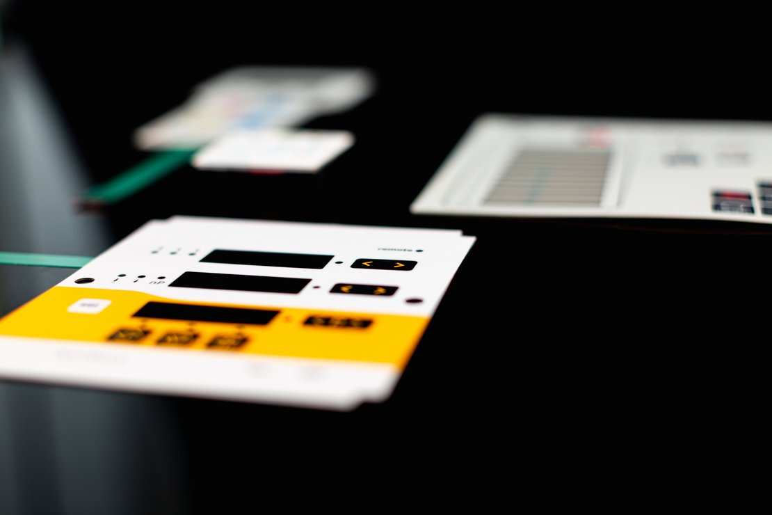 Membrane keyboard with black coloured windows